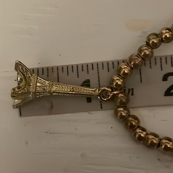 6” golden beaded stackable stretch bracelet with Eiffel Tower pendant & 39 beads - Picture 10 of 11